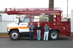 Encore Image team standing next to Encore truck