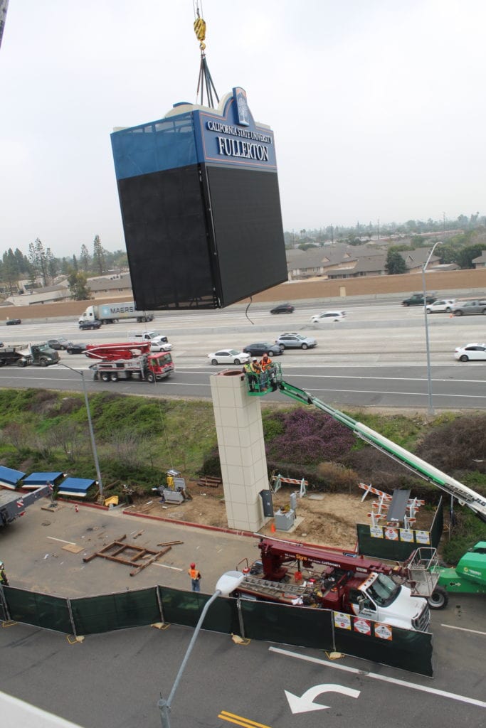 CSUF graphic display sign raised above base for construction