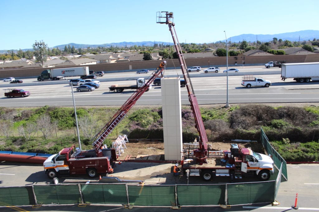 CSUF graphic display sign construction next to the freeway